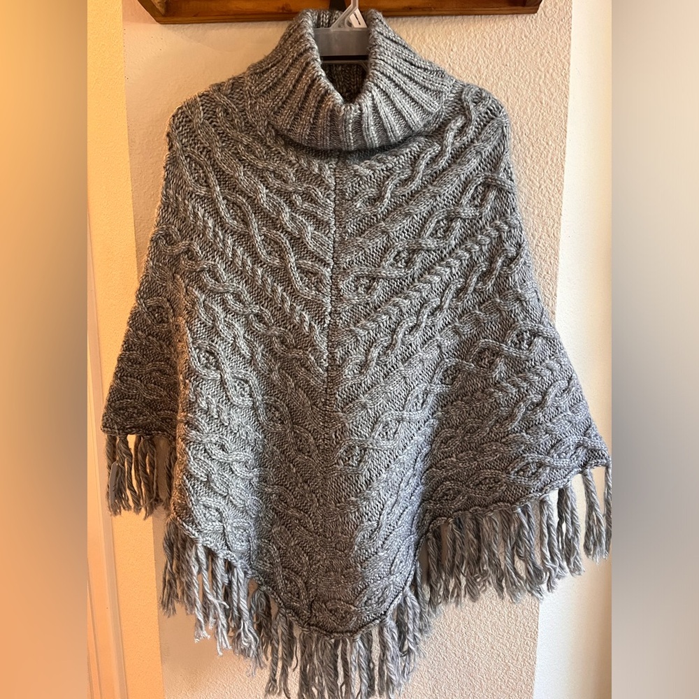 Brand new one size fits all Ponco turtle neck